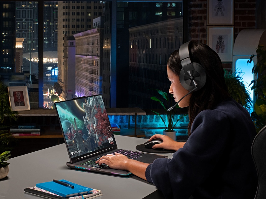 Front view of Lenovo Legion laptop open 90 degrees, angled sharply to the right showing display screen, keyboard and left side ports.